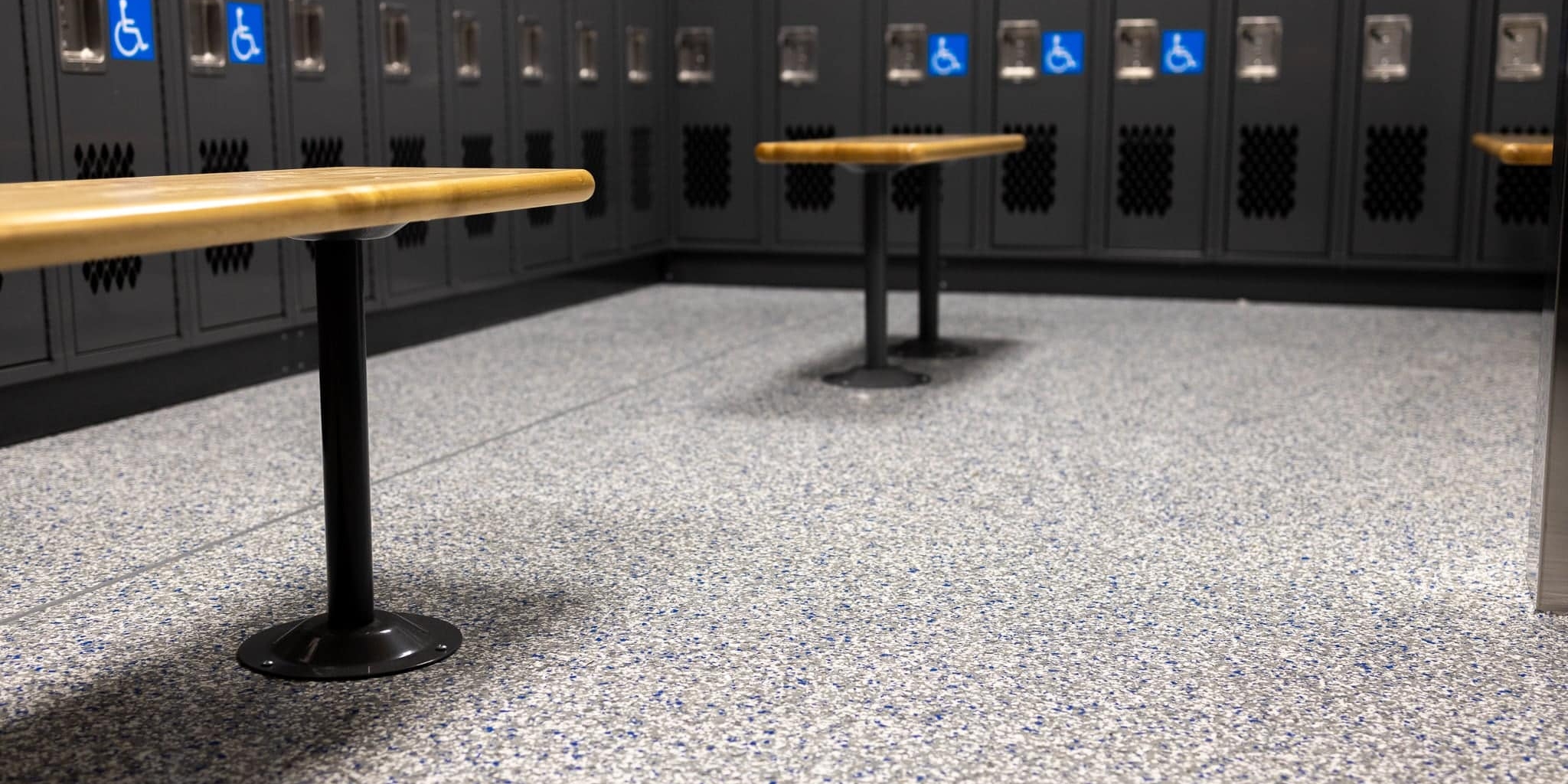 Interior of locker room floor and composite bench