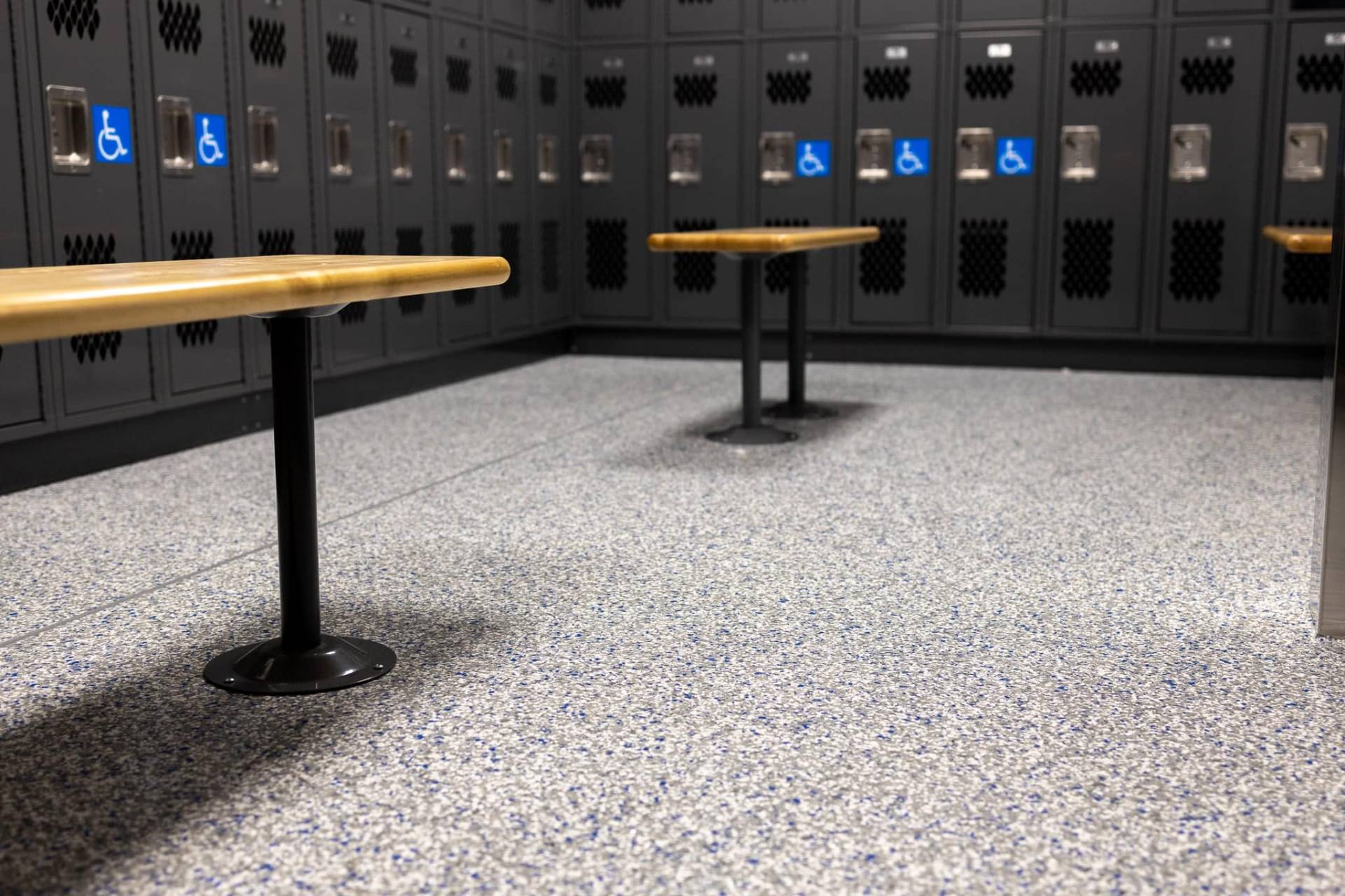 Interior of locker room floor and composite bench